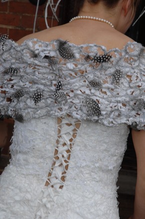 textile art dress from behind